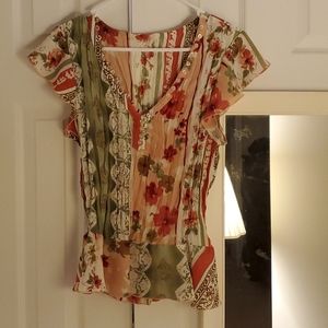 Ruffled pink and green blouse